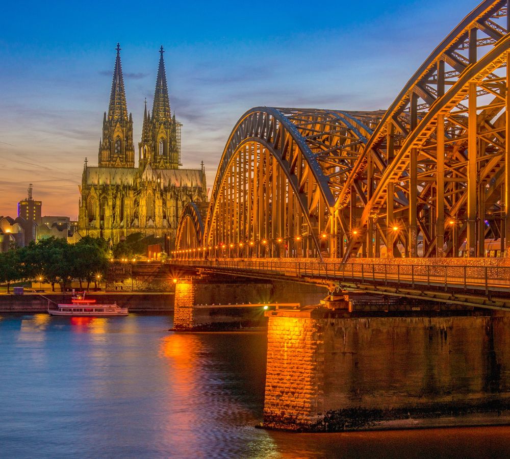 Cologne bridge with the cathedral. beautiful sunset at the Rhine river