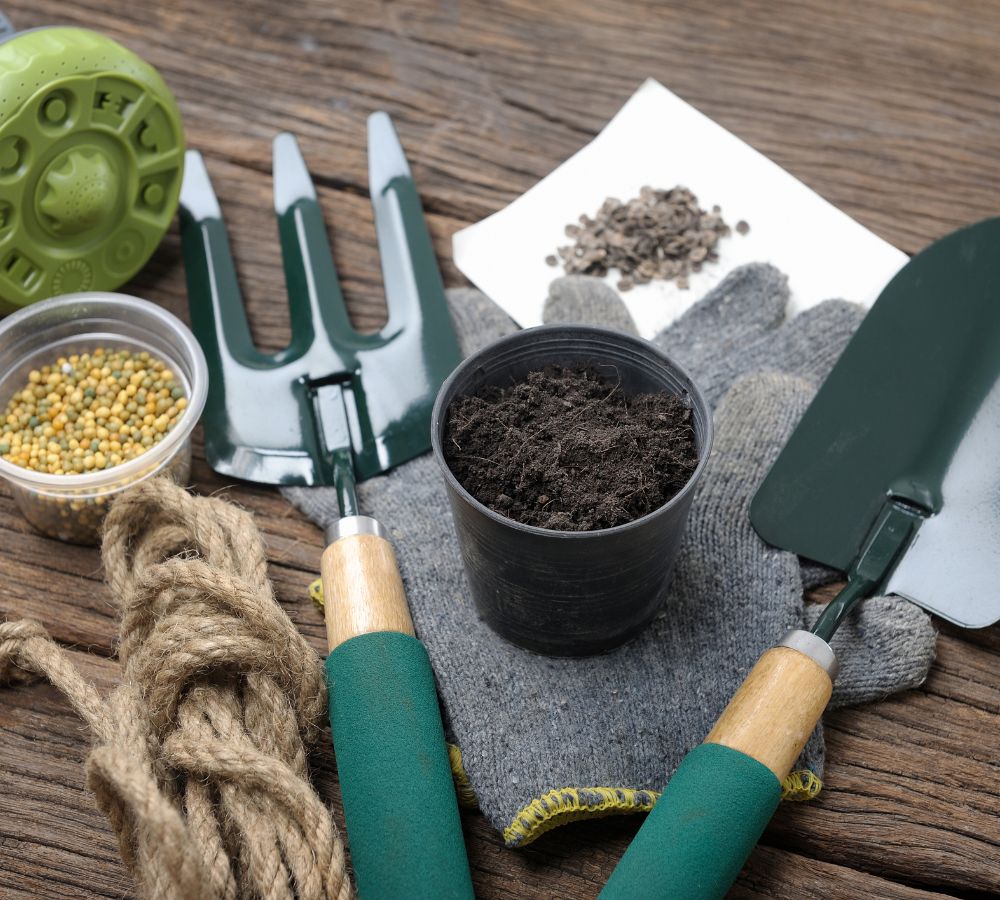 gardening tools and black soil