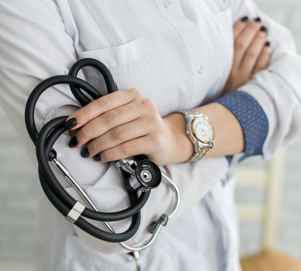 Doctor has a stethoscope in her hand