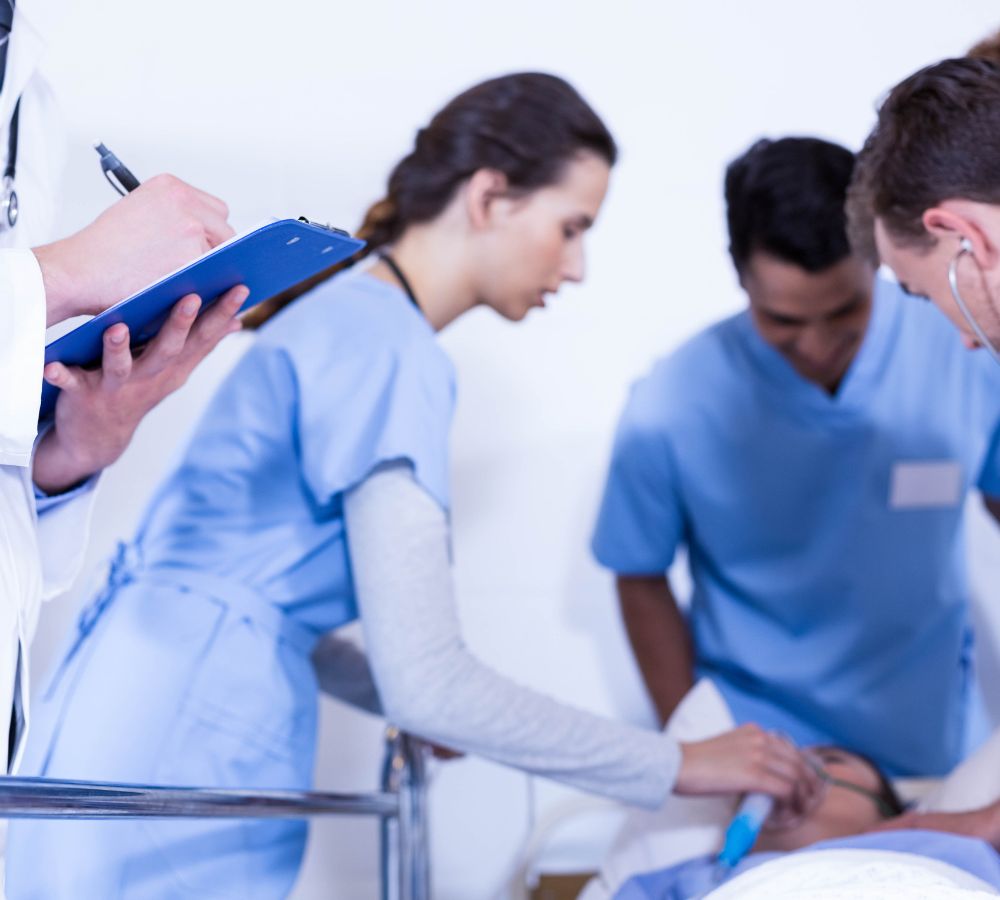 Doctor writing on clipboard