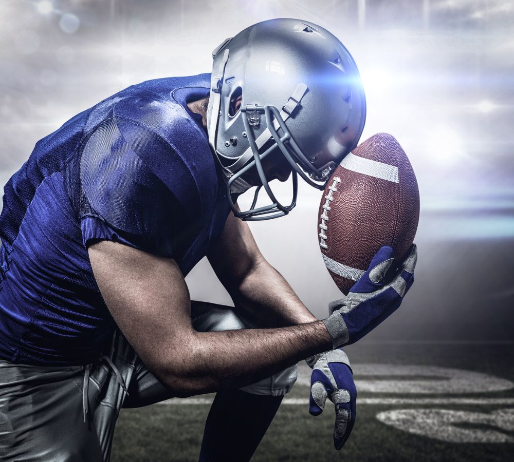 super bowl football player with ball