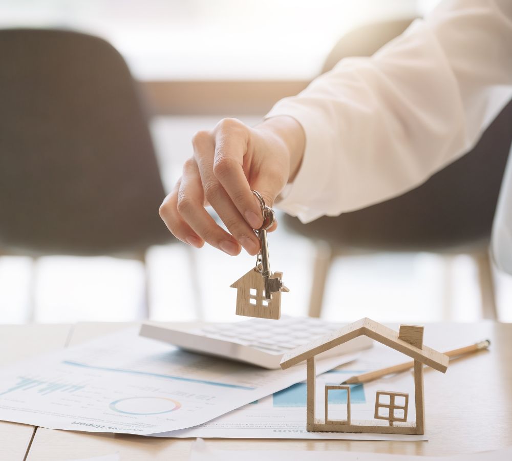 House model with real estate agent