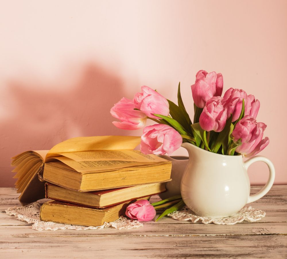 Poem books and pink tulips