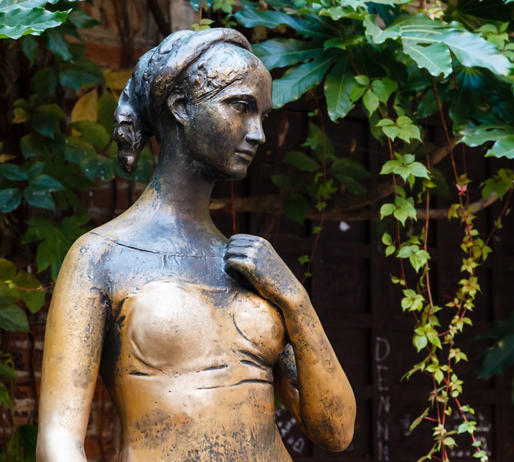 Statue of Juliet Capulet in Her House Backyard in Verona