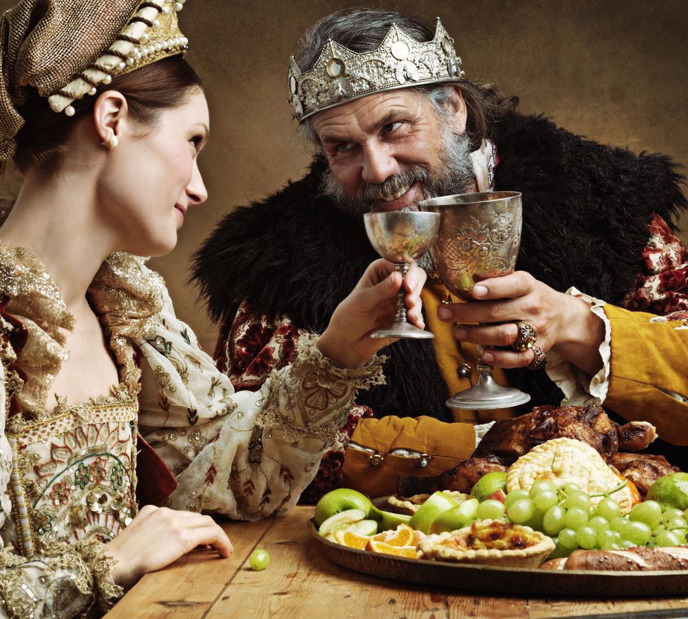 king feasting in a banquet hall